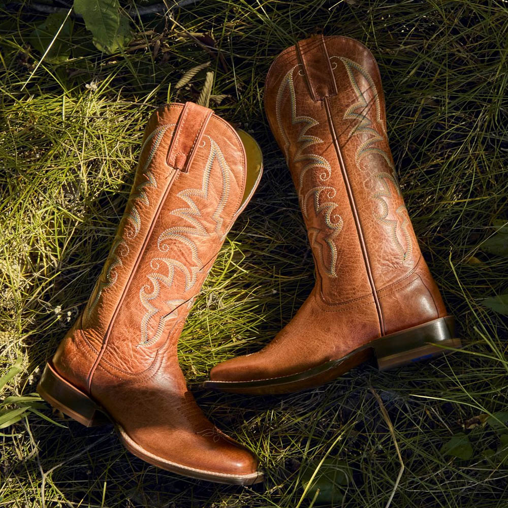 Featuring the Helena 13” Western boot in brown.